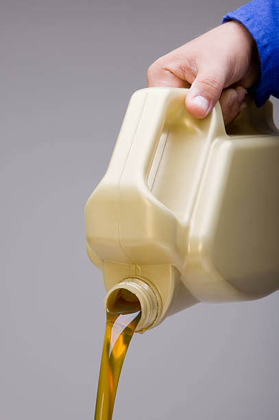 istock Human hand pouring oil 113520746