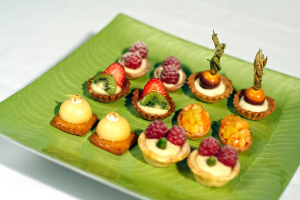 istock Cakes varied in green tray 1135207785