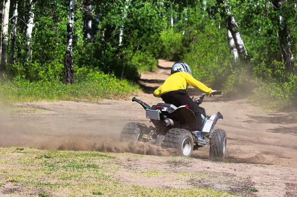 istock A young boy on a quad does spins in the dirt 1135209303