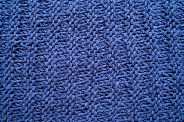 istock Macro of a woolen blue sweater. Knitting Pattern 1135210285