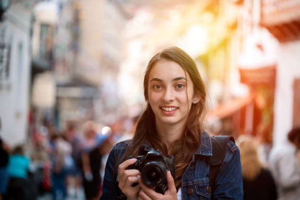 istock Young girl taking photos 1135210343