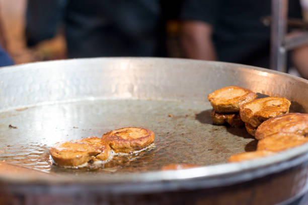 istock Lucknow's famous galouti kebab being fried on a pan 1135211165