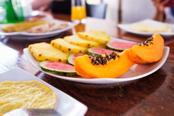 istock plate containing pieces of fruit, papaya, watermelon and pineapple. 1135212230