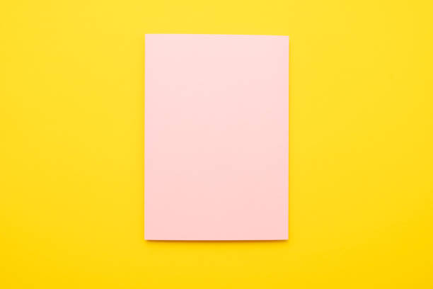istock yellow and pink paper texture background. empty copyspace for your ad and text. 1135213345