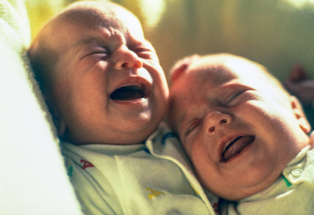 istock Twin girls crying 1135213525