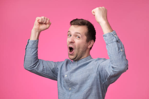 istock Happy young european man gesturing and smiling 1135214916