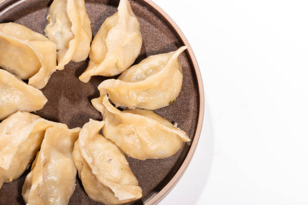 istock Steamed dumplings and seasonings on the table 1135221074