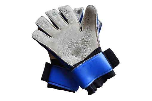 Top view old goalkeeper gloves and dilapidated,isolated on white background with clipping path.