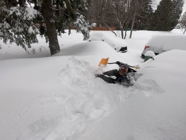 Drifting snow accumulated outside the house block the window