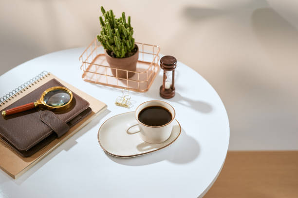 istock Flatlay of home office desk table. Workspace with brown leather notebook and decorations on white background 1135234900