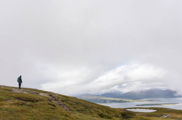 istock Hiker enjoying view near Tromso, Norway 1135237572