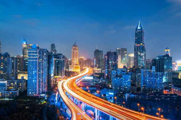 istock shanghai elevated road junction and interchange overpass at night 1135241511