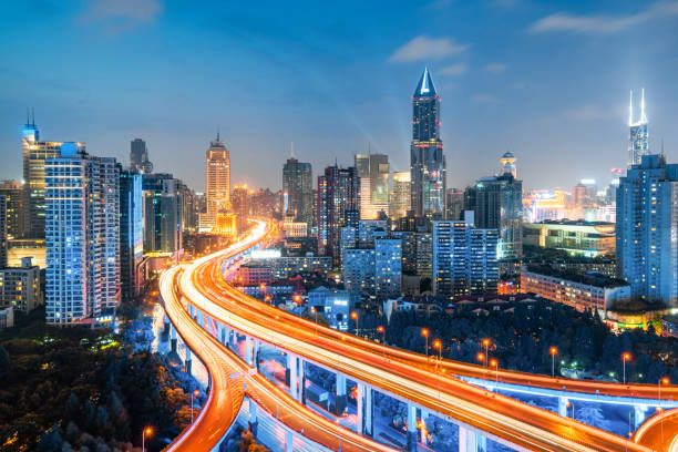istock shanghai elevated road junction and interchange overpass at night 1135241757