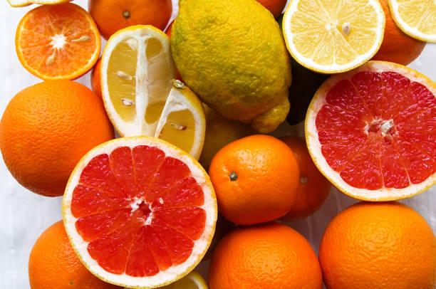 istock many sliced citrus fruits are on the table 1135249222