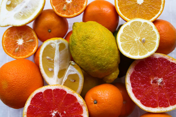 istock many sliced citrus fruits are on the table 1135249841