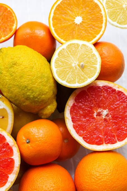 istock many sliced citrus fruits are on the table 1135250021