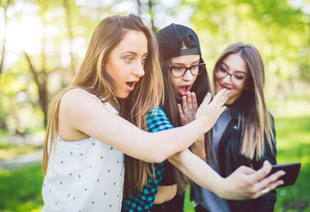 istock Hipster girls taking selfies 1135254585