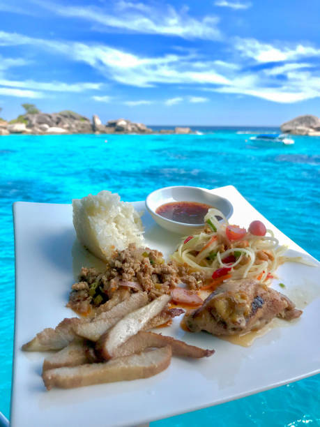 istock somtam thai food with ocean background 1135255836