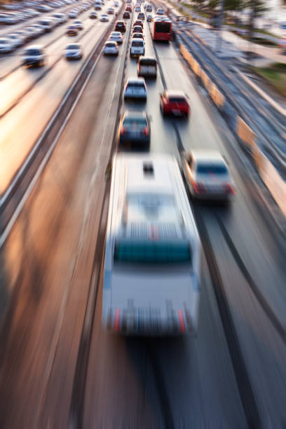 istock Blurry image of rush hour traffic on busy highway at sunset 1135258244