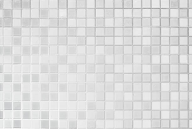 istock White or gray ceramic wall and floor tiles abstract background. 1135260929