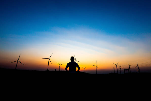 istock Silhouette of Man happy at sunset 1135266091