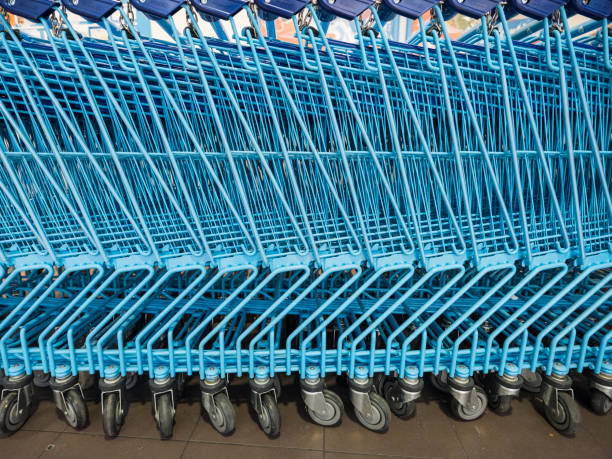 istock blue supermarket carts 1135269106