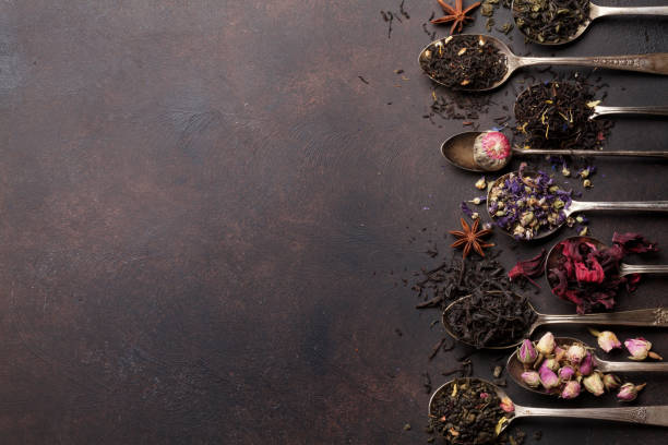 istock Various tea in spoons. Black, green and red tea 1135270564