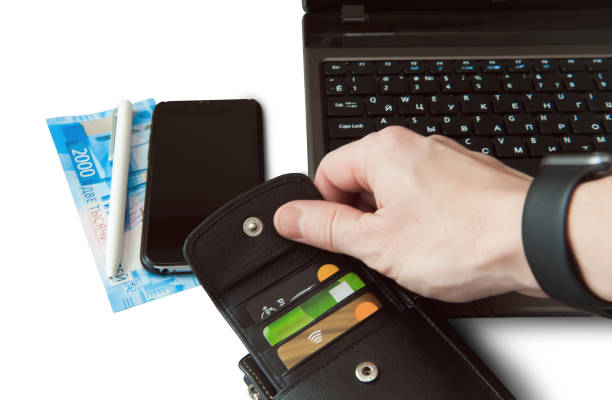istock Money on the laptop keyboard. 1135271256
