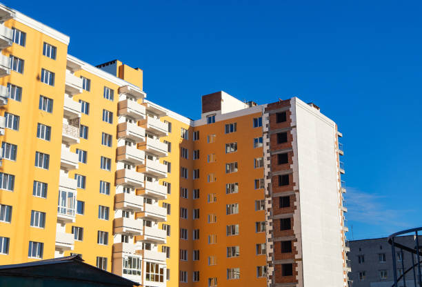 istock Almost finished facade work and insulation of new multistory building 1135279314