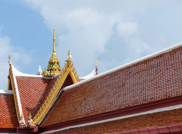 Red roof of thai temple with Gable apex,buddhism, copy space Close up of Thai tample roof, copy space golden tample stock pictures, royalty-free photos & images