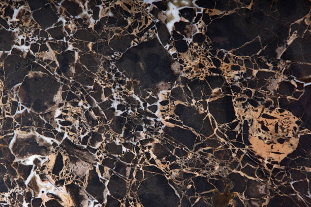 istock Brown marble with yellow and white veins, called Emperador gold 1135280250