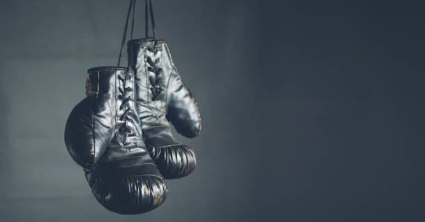 istock boxing gloves on the dark background 1135280752
