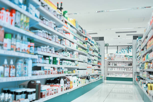 If you need, it's here Cropped shot of fully stocked shelves in an aisle of a pharmacy pharmacy photos stock pictures, royalty-free photos & images