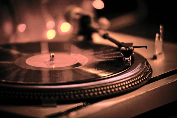 istock Close-Up Of Turntable Against Illuminated Lights 1135284686