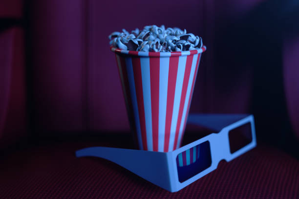 illustrazione 3d con popcorn, occhiali 3d e sedie, con luce blu. concept sala cinema e teatro. sedie rosse nella sala cinema. - stage theater theatrical performance curtain seat foto e immagini stock