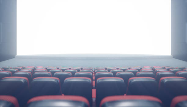 istock Cinema hall with blank screen and empty seats. Modern design with striking lighting, neon lighting. Audio system on the walls. Cinema hall without people. White screen with copy space, 3D illustration 1135289229