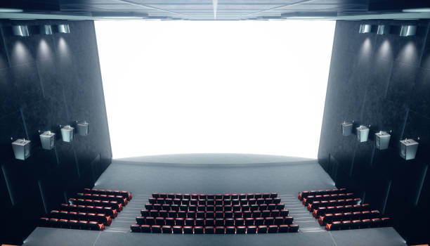 istock Cinema hall with blank screen and empty seats. Modern design with striking lighting, neon lighting. Audio system on the walls. Cinema hall without people. White screen with copy space, 3D illustration 1135289236