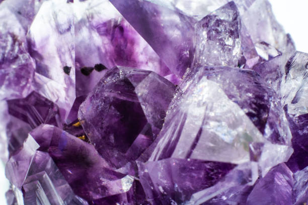 istock Abstract background texture of natural crystal amethyst close up 1135290196