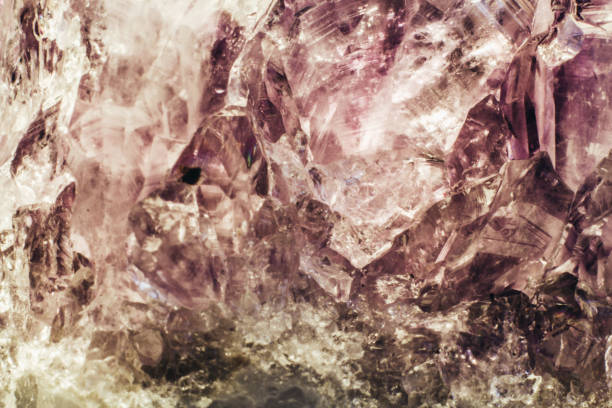 istock Abstract background texture of natural crystal amethyst close up 1135290203