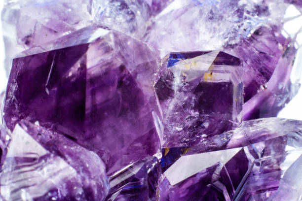 istock Abstract background texture of natural crystal amethyst close up 1135290204