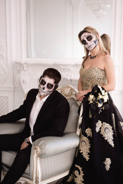istock A couple with skeleton make up for Halloween or All Souls Day 1135290252