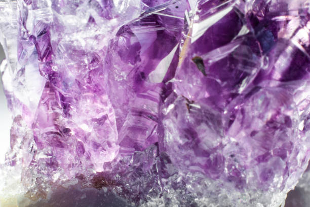 istock Abstract background texture of natural crystal amethyst close up 1135291399