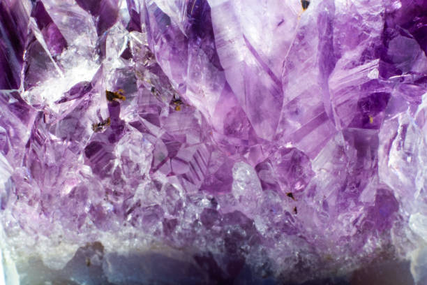istock Abstract background texture of natural crystal amethyst close up 1135291402