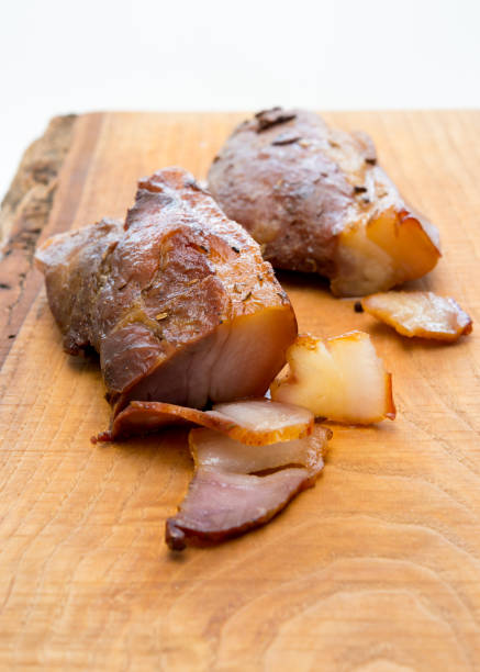 istock Smoked cured pork on cutting board 1135291408