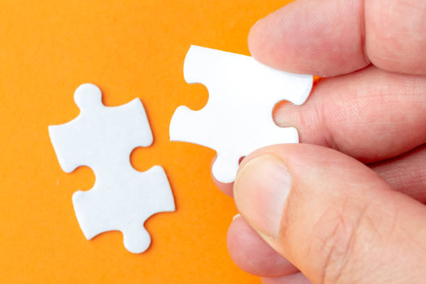 istock Creating or building own business concept. Puzzle piece, construction and development concept 1135292447
