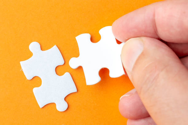 istock Creating or building own business concept. Puzzle piece, construction and development concept 1135292453