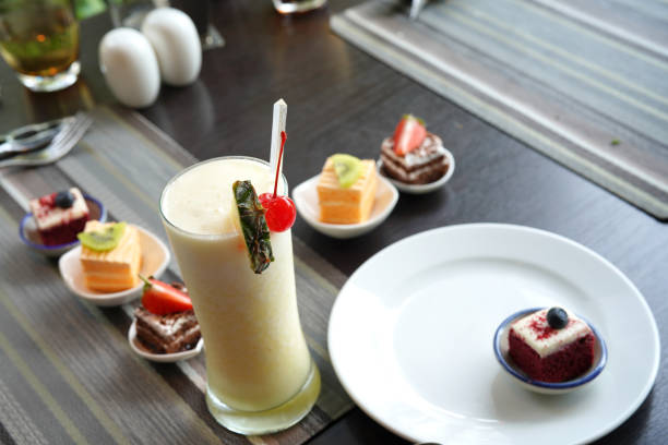 istock blend pineapple juice and mini cake on the table 1135294229