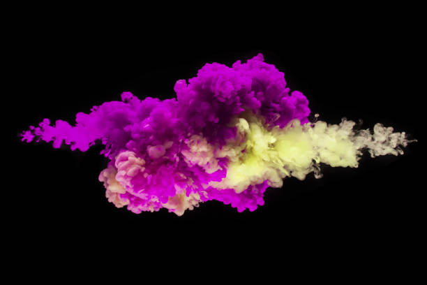 istock Coloured acrylic ink mixing in water on black 1135295531