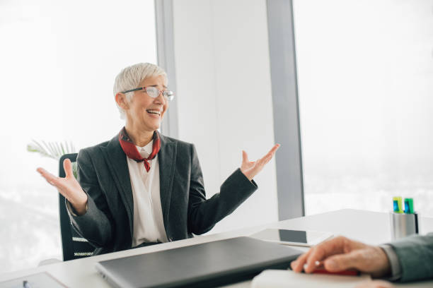 istock Happy mature business woman 1135295761