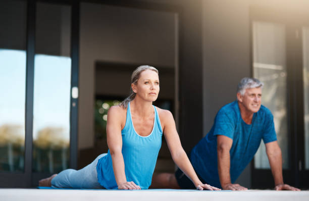 istock Starting off our day with a much needed yoga session 1135297605